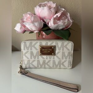 Michael Kors wallet wristlet gently used white and light brown